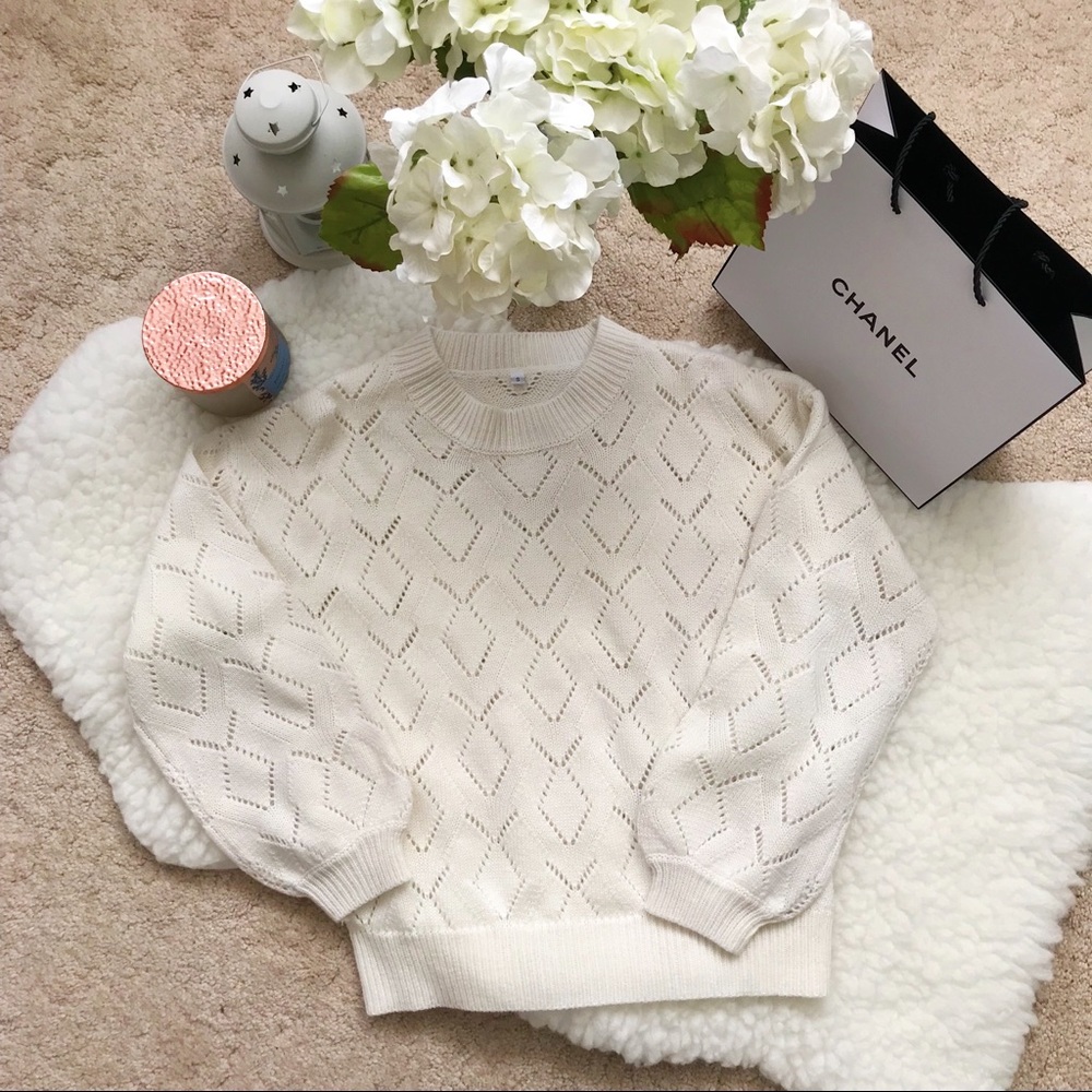 New white sweater